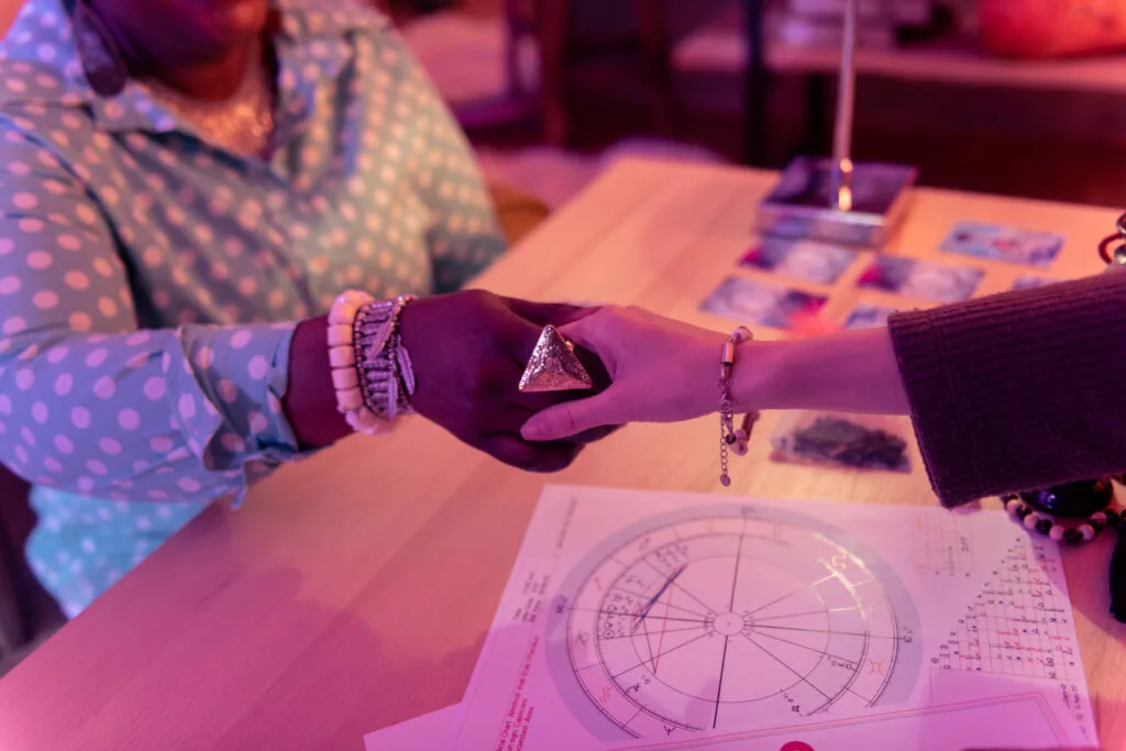Astrologer and client during a personal astrology consultation